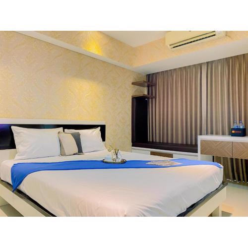 Homey and Comfy Studio H Residence Apartment By Travelio