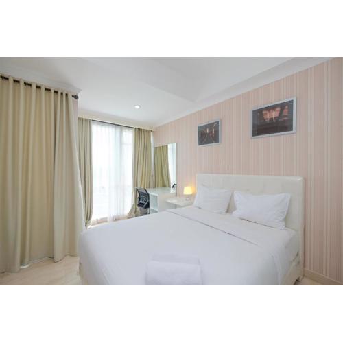 Homey and Comfy Studio Room at Menteng Park Apartment By Travelio