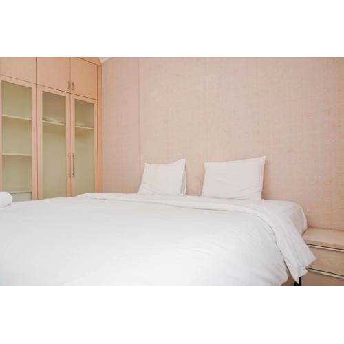 Homey and Compact 2BR Mediterania Marina Ancol Apartment By Travelio