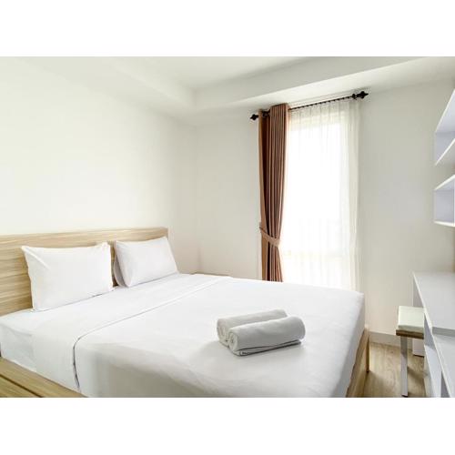 Homey and Compact Studio at Azalea Suites Apartment By Travelio