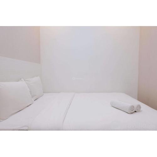 Homey and Cozy 2BR Apartment at Parahyangan Residence By Travelio