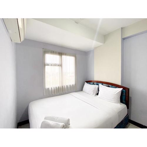 Homey and Cozy Living 2BR Lagoon Bekasi Town Square Apartment By Travelio