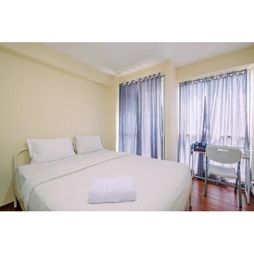 Homey and Cozy Living Studio Room at Tifolia Apartment By Travelio