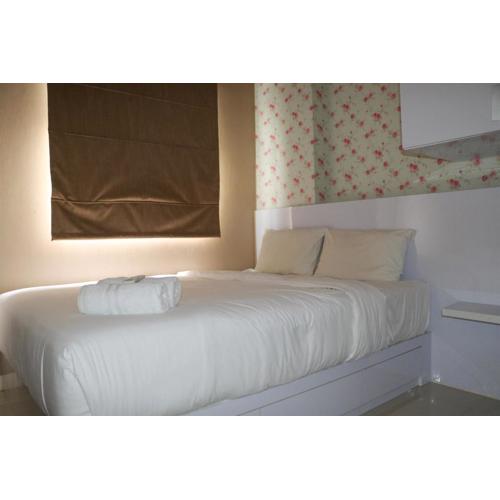 Homey and Cozy Stay 2BR at Green Pramuka City Apartment By Travelio