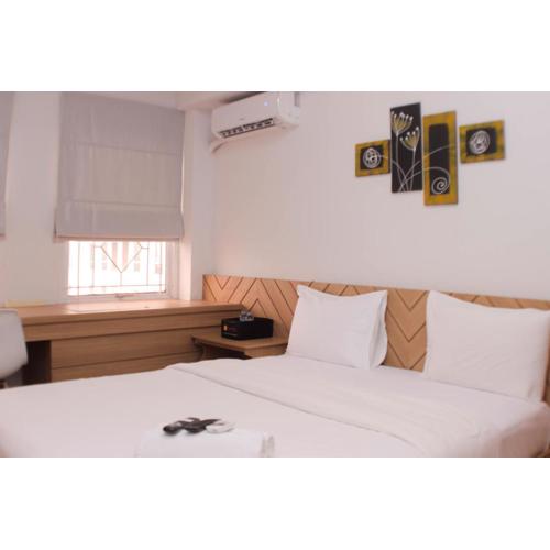 Homey and Cozy Stay Studio Apartment at Patraland Urbano By Travelio