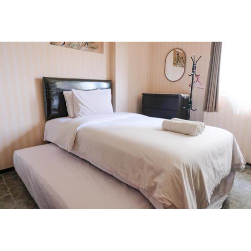 Homey and Cozy Studio Room at Suites @Metro Apartment By Travelio