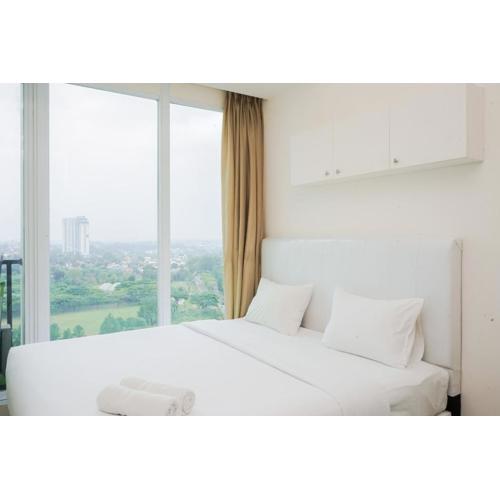 Homey and Cozy Studio Room at Tree Park City BSD Apartment By Travelio
