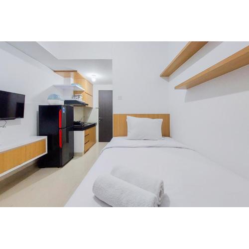 Homey and Cozy Studio Room Serpong Garden Apartment By Travelio