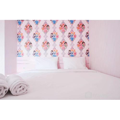 Homey and Fresh 2BR Green Pramuka Apartment By Travelio