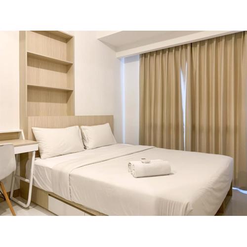 Homey and Functional 2BR Tokyo Riverside PIK 2 Apartment By Travelio