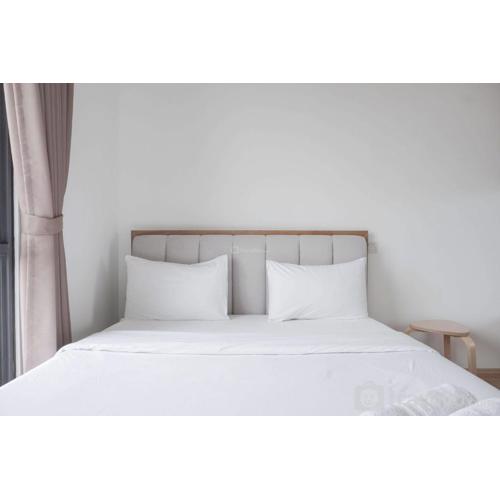 Homey and High Floor 2BR at Sky House BSD Apartment By Travelio