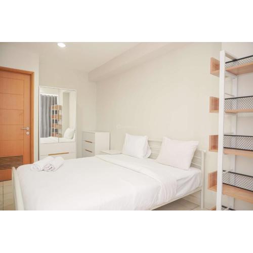Homey and Minimalist 1BR Cinere Bellevue Suites Apartment By Travelio