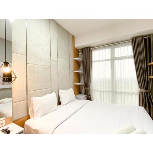 Homey and Minimalist 1BR Vasanta Innopark Apartment By Travelio