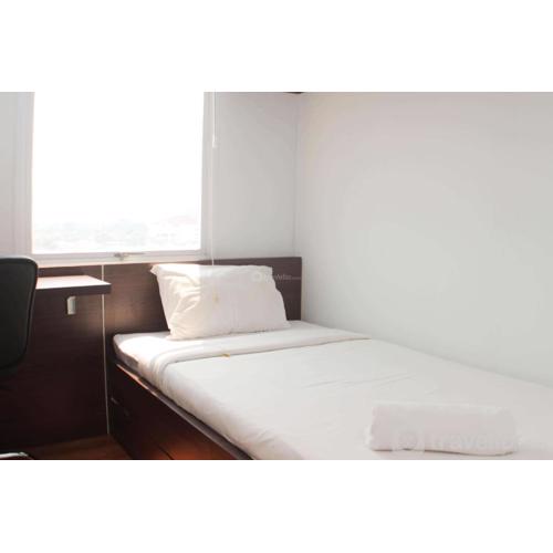 Homey and Minimalist 2BR at Patraland Urbano Apartment By Travelio