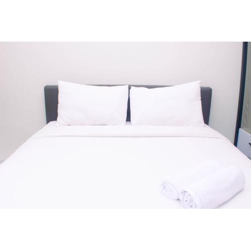 Homey and Minimalist Studio at Vasanta Innopark Apartment By Travelio