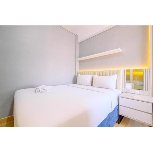 Homey and Modern Look 2BR Transpark Cibubur Apartment By Travelio