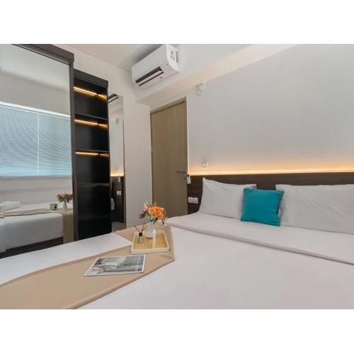 Homey and Modern Look 3BR at Meikarta with Balcon Apartment By Travelio