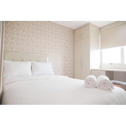 Homey and Modern Studio at Sky Terrace Apartment By Travelio