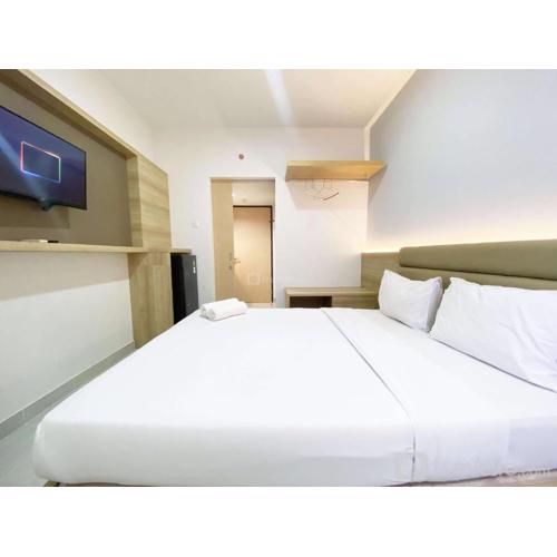 Homey and Modern Studio The Alton Apartment By Travelio