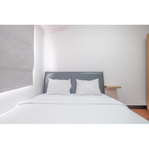 Homey and Nice 2BR at Cinere Resort Apartment By Travelio