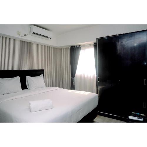 Homey and Relaxing 2BR The Wave Apartment By Travelio