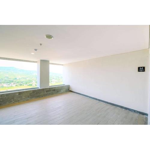 Homey and Restful Studio Royal Sentul Park Apartment By Travelio