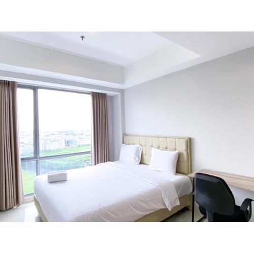 Homey and Serene 1BR at The Mansion Kemayoran Apartment By Travelio