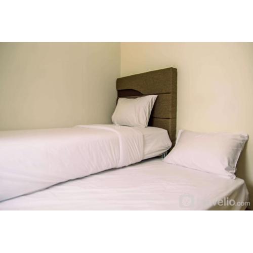 Homey and Serene 2BR at Great Western Resort Apartment By Travelio