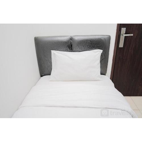 Homey and Simply 2BR at Serpong Greenview Apartment By Travelio