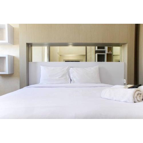 Homey and Tidy Studio at The Oasis Apartment By Travelio