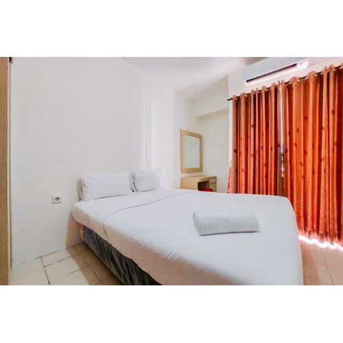 Homey and Tidy Studio Serpong Greenview Apartment By Travelio