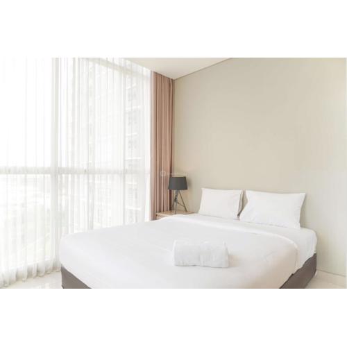 Homey and Warm 1BR at Ciputra International Apartment By Travelio