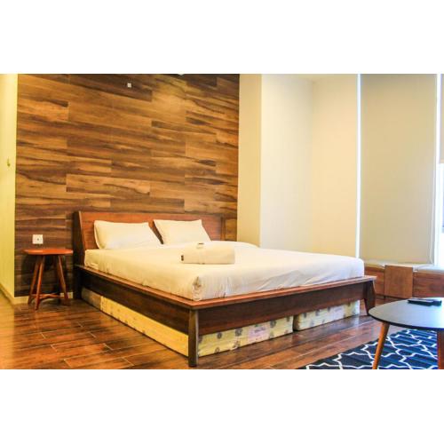 Homey and Warm 3BR Apartment at Ambassade Residences By Travelio