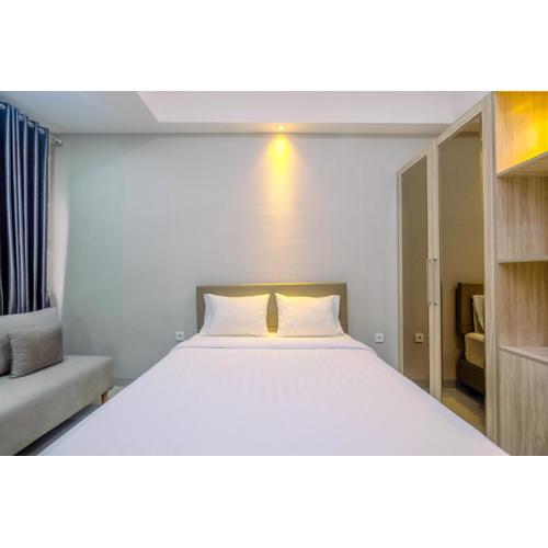 Homey and Warm Studio Apartment Oasis Cikarang By Travelio