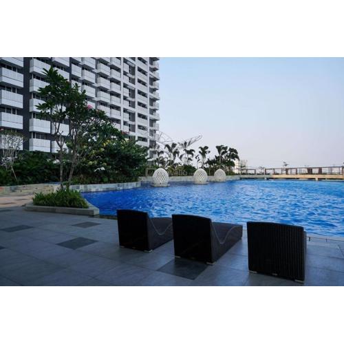 Homey and Wonderful Studio at West Vista Apartment By Travelio