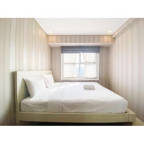 Homey Apartment with 1BR at Parahyangan Residence By Travelio