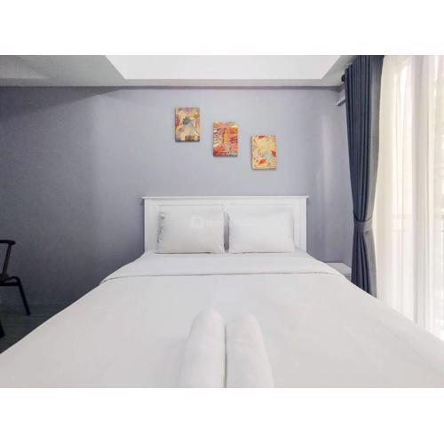 Homey Grey Studio Apartment at Grand Asia Afrika Bandung By Travelio