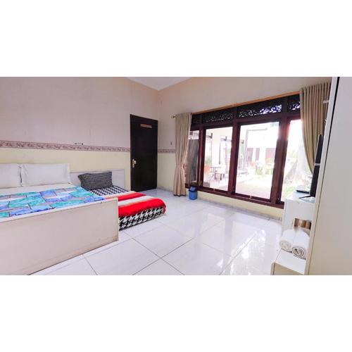 Homey Guesthouse near Sby Zoo Syariah