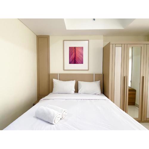 Homey Living Studio at Pollux Chadstone Apartment By Travelio