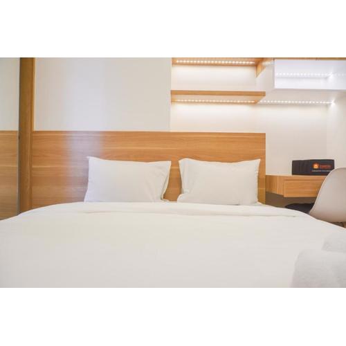 Homey Living Studio Room at Tokyo Riverside PIK 2 Apartment By Travelio