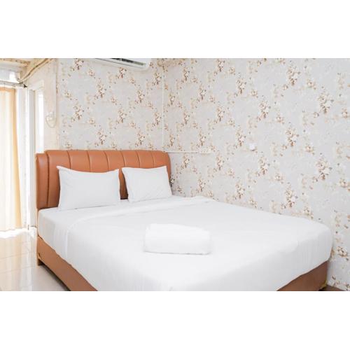 Homey Studio Apartment at Green Palm Residence By Travelio