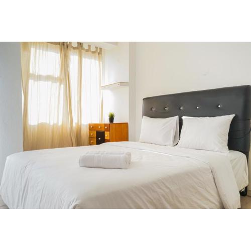 Homey Studio Apartment at Margonda Residence 3 By Travelio