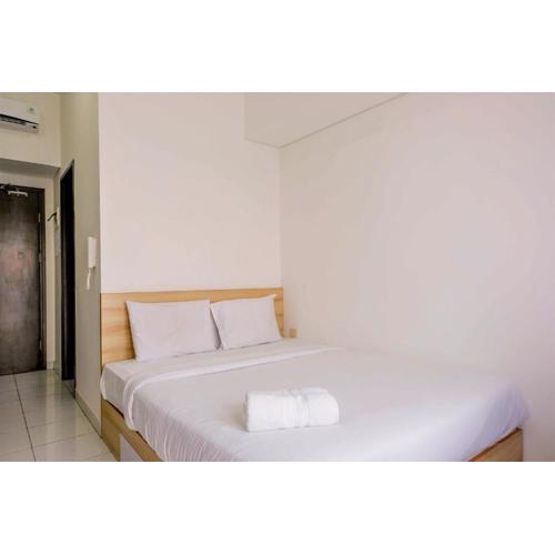 Homey Studio at Casa De Parco Apartment By Travelio