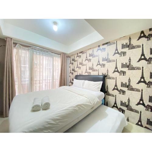 Homey Studio Furnished at Grand Asia Afrika Apartment By Travelio