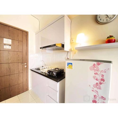 Homey Studio Room at Harvard Jatinangor Apartment By Travelio