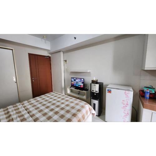 Homy Studio Apartment at Depok by Miapato