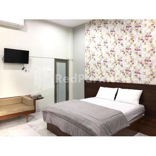 Hotel D88 Mitra RedDoorz Near Santera Flower Garden