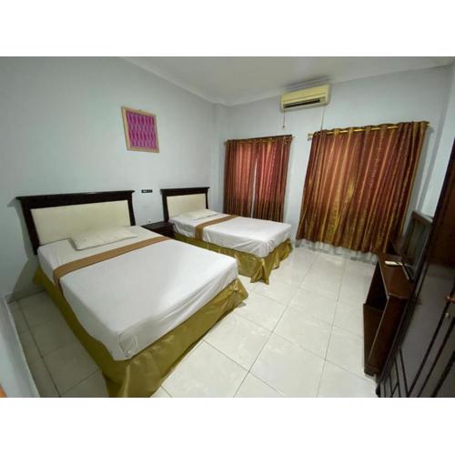 Hotel Magellona Makassar Mitra RedDoorz