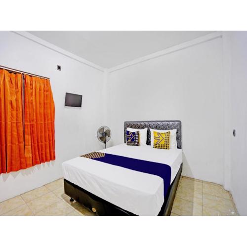 Hotel O Griya Sandi Residence Family NearPantai Boom