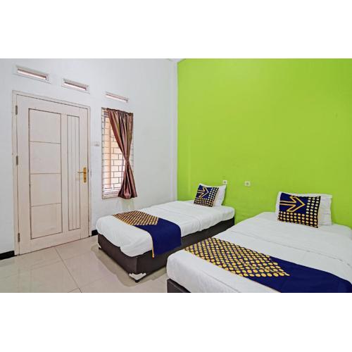 Hotel O Penginapan Puti SyariahNearBandara Sultan Syarif Kasim II